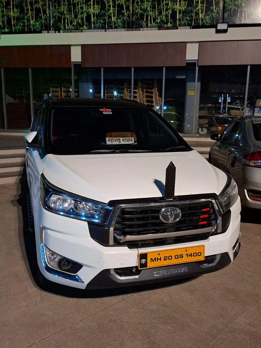 Toyota Innova Crysta parked outside our office in the evening